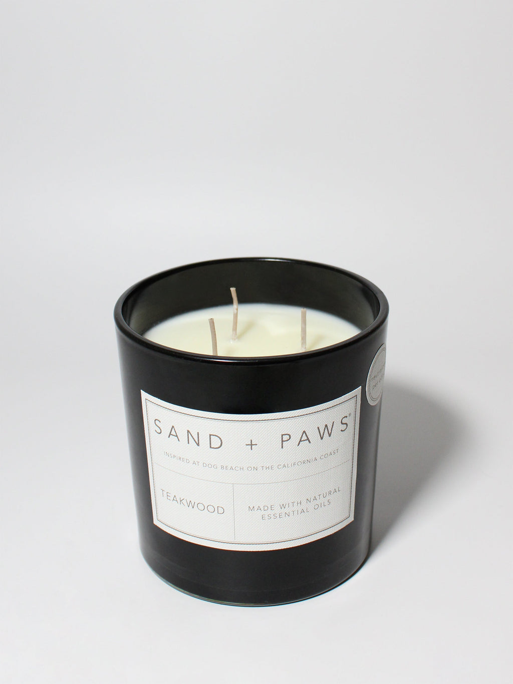 Sand + Paws Teakwood 21 oz aromatic scented candle